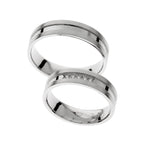 White gold wedding rings with polished center