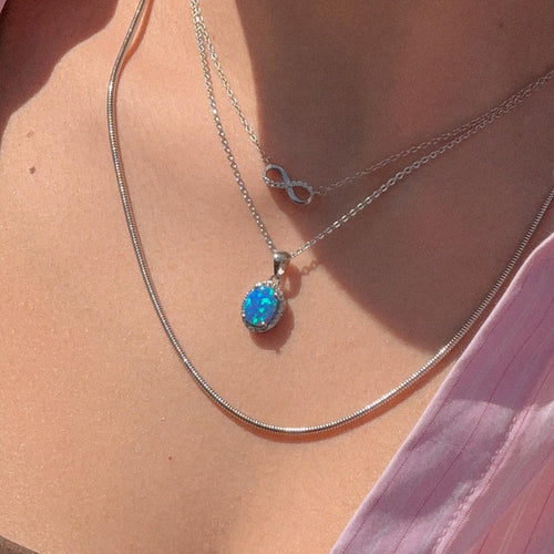 Oval blue opal pendant