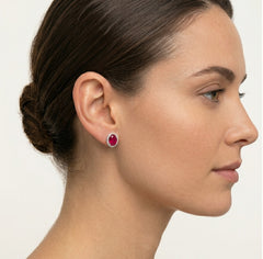 Halo oval cut ruby on sterling silver earrings