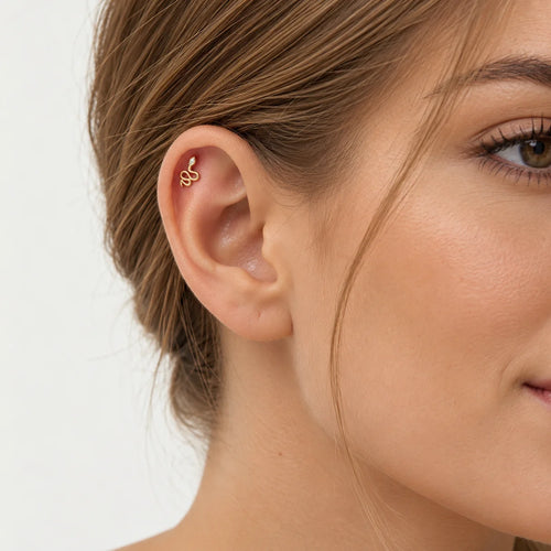 Piercing ze žlutého zlata s hadem a zirkonem
