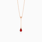 Diamond necklace with garnet drop