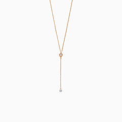 Rose gold necklace with dangling diamond