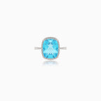 Bright white gold ring with topaz and diamonds