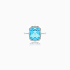 Bright white gold ring with topaz and diamonds