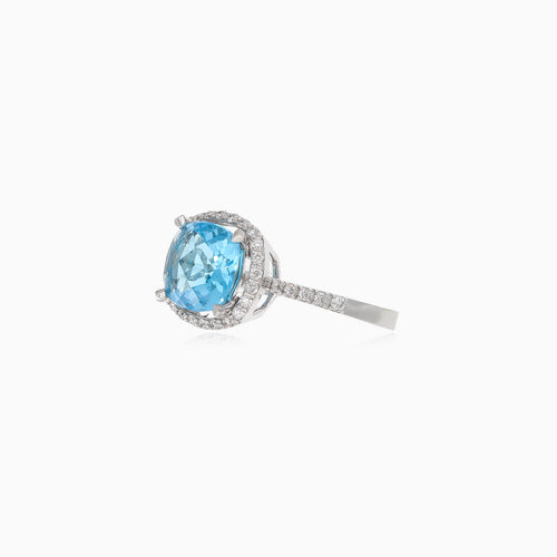 Eleganter Weißgoldring mit Diamant und Blauem Topas