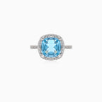 Sophisticated diamond and blue topaz white gold ring