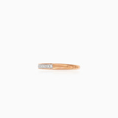Romantic rose gold ring with line of diamonds