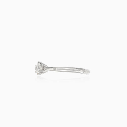 White gold ring with round diamond