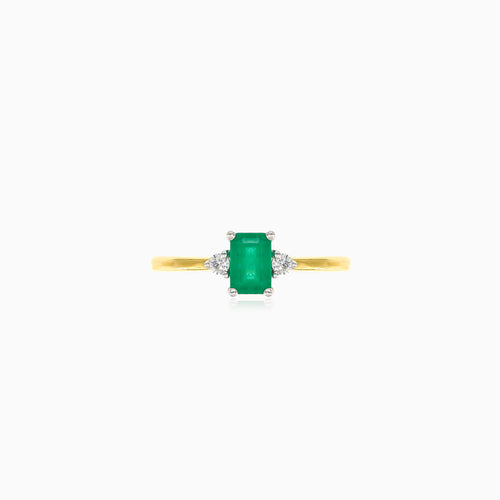 Eleganter Ring aus Gelbgold mit Diamanten und Smaragd