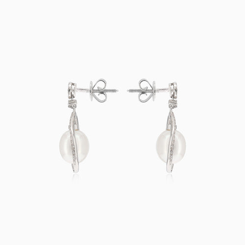 Unique gold earrings with diamond frame and pearl
