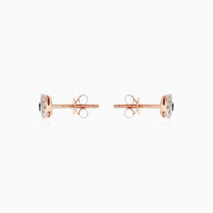 Stylish rose gold earrings with black and white diamonds