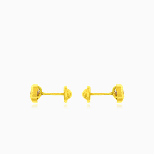 Winzige Ohrstecker in Herzform aus Gelbgold mit Zirkonia