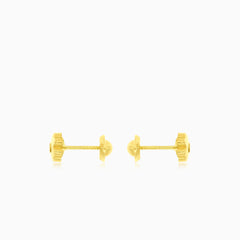 Boucles d'oreilles en or jaune en forme de fleur avec zircon cubique.