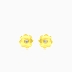 Boucles d'oreilles en or jaune en forme de fleur avec zircon cubique.