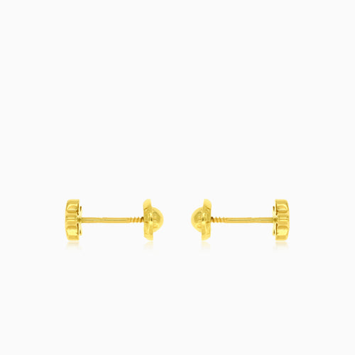 Pendientes infantiles de estrella en oro amarillo con circonitas
