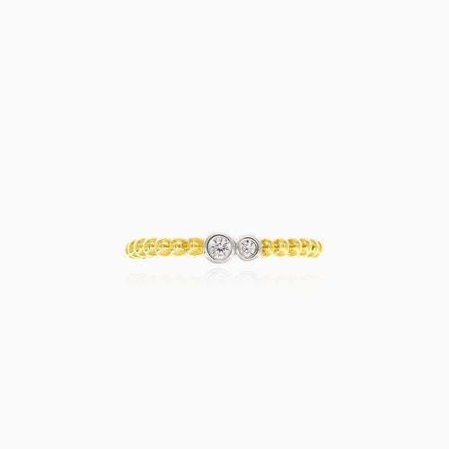 Yellow gold ring adorned with sparkling cubic zirconia