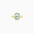 Gelbgoldring mit himmelblauem Topas