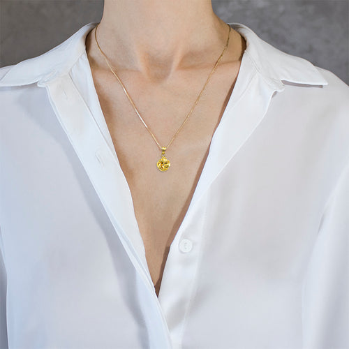 Anhänger aus Gelbgold mit Hochglanzpolitur in Knotenform