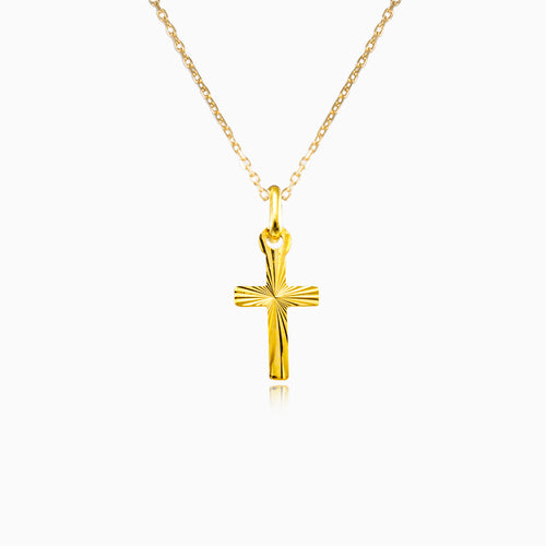 Kleines goldenes Kreuz mit Diamantschliff