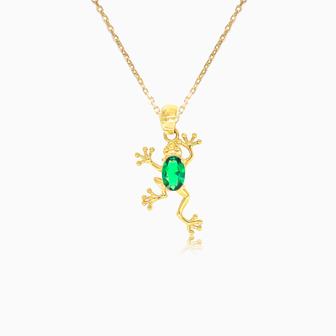 14kt gold frog pendant with synthetic emerald body – Princess