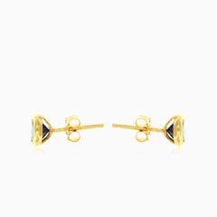Blue Sapphire stud earrings in yellow gold