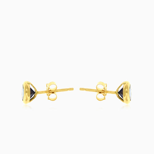 Blue Sapphire stud earrings in yellow gold
