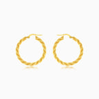 Gelbgold gedrehte runde Creolen