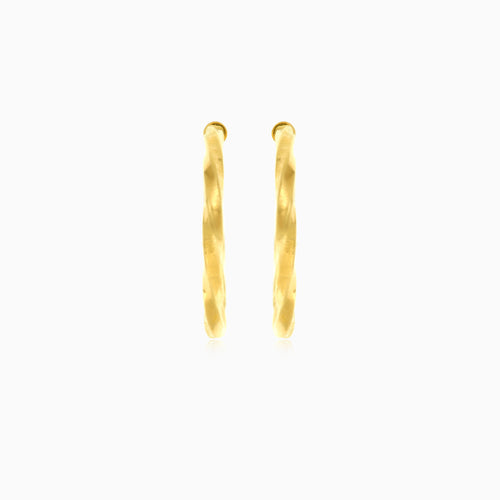 Twisted yellow gold hoop earrings