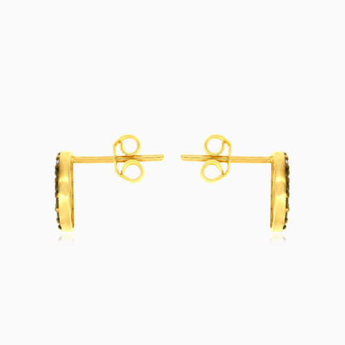 Gelbgoldene Kreis-Ohrringe mit schwarzem Onyx.