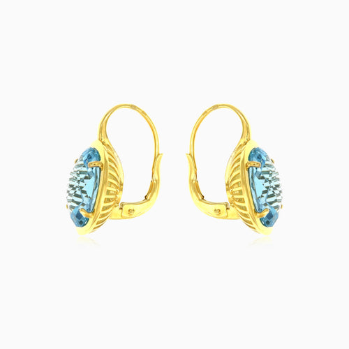 Zlaté náušnice s oválným modrým topazem