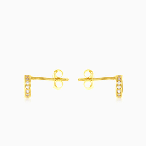 Runde Ohrstecker aus Gelbgold mit Zirkonia im Rahmen