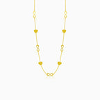 Gold necklace with hearts and infinity symbols