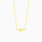 Gold necklace with heartbeat symbol
