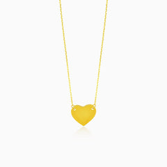 Gold necklace with heart
