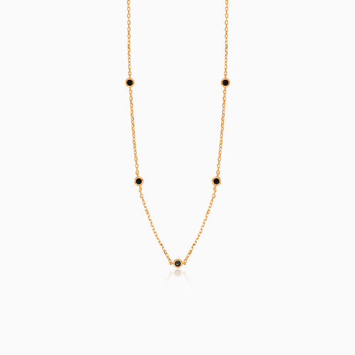 Collar en oro rosa con ónix