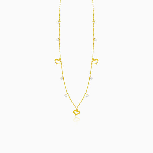 Gold necklace with hearts and zircons