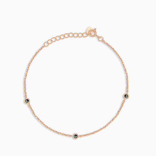 Bracelet en argent plaqué or avec onyx.