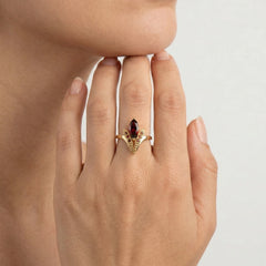 Majestic marquise garnet and gold beauty ring