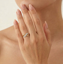 Infinity gold ring with two cubic zirconia rows