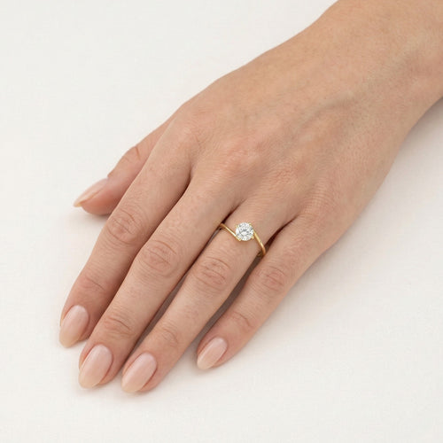 Kroucený solitérní zlatý prsten