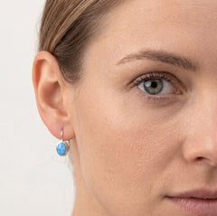 Drop earrings with oval blue opal