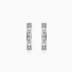 Channel-set white gold earrings