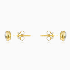 Goldene Ohrstecker mit Smaragd und Diamanten