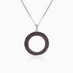 Open circle garnet pendant