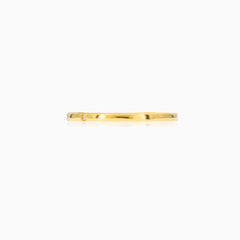 Thin yellow gold ring and zircons