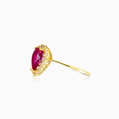 Pear rubellite yellow gold ring