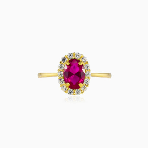 Oval rubellite halo gold ring