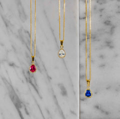 Pear-cut cubic zirconia yellow gold pendant