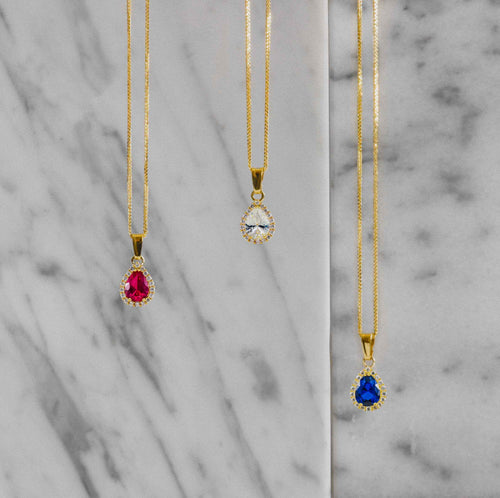 Pear-cut cubic zirconia yellow gold pendant
