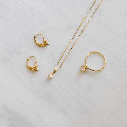 Six prong gold pendant